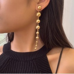 pendientes largos dorados originales